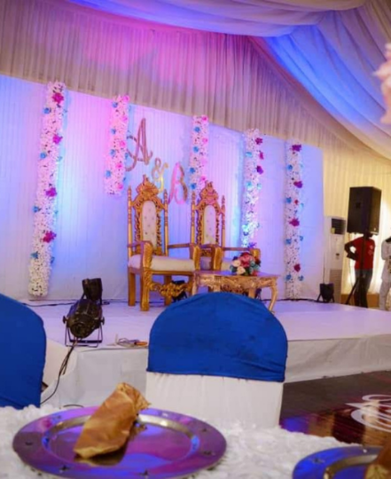 A view of a stage for a bride and groom at a wedding reception